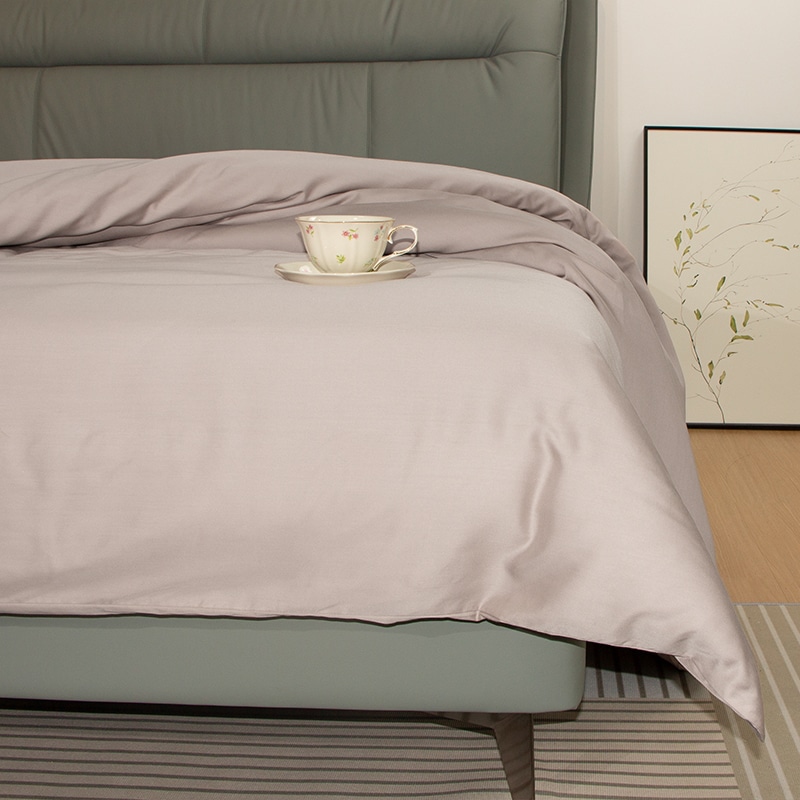 Bambu påslakan sand - bild av lakan på en säng